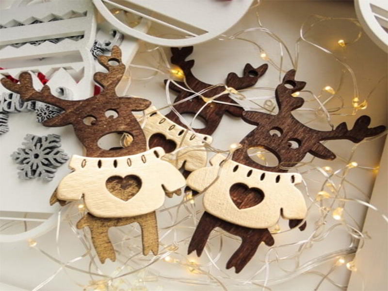 Laser Cut Christmas Reindeer Ornament Wearing Sweaters