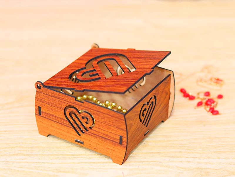 Laser Cut Wooden Box with Heart Cutouts Used as Gift or Jewelry Box